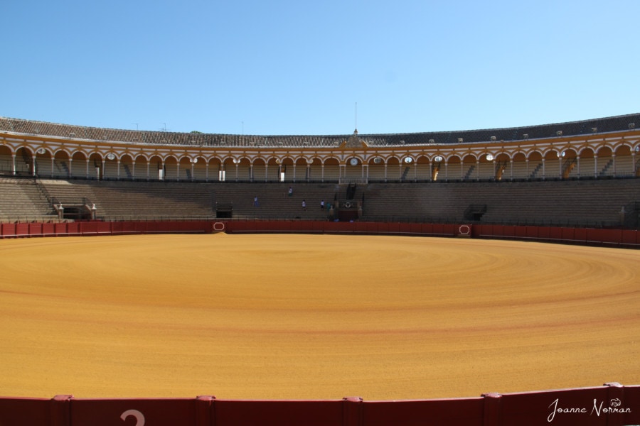 large round arena with orange dirt base on Spain itinerary