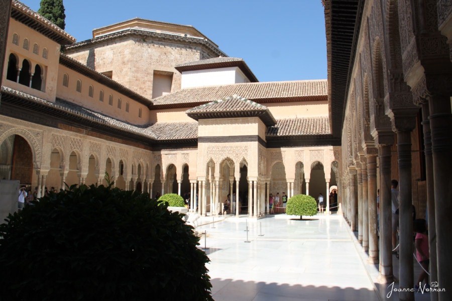 courtyard surrounded by arches of the Alhambra