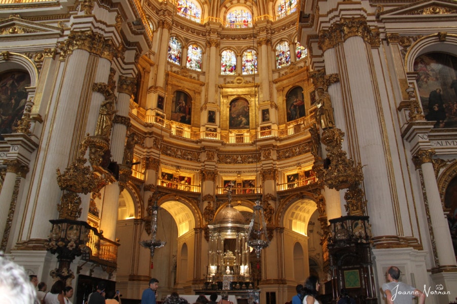interior of cathedral filled with golden color is one of most beautiful places in Spain