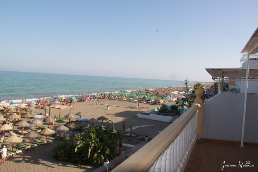 view of large beach from high veranda is great for Spain with kids