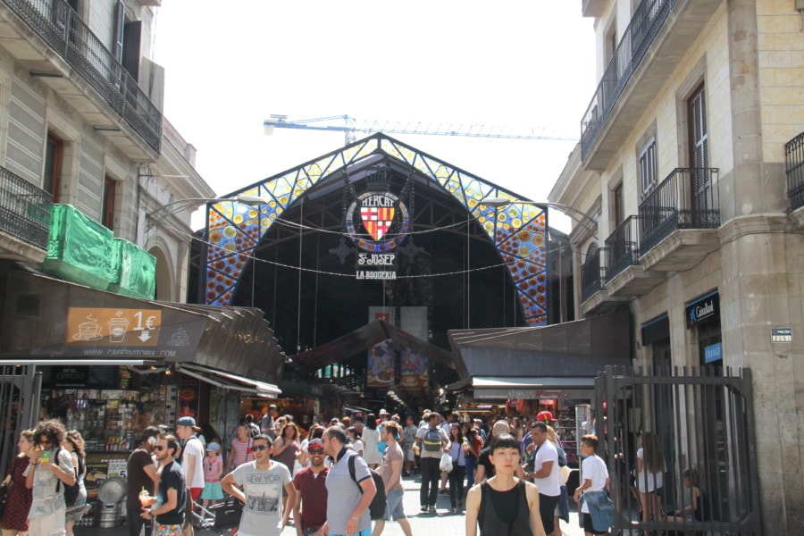 front view of large La Boqueria Market in Barcelona itinerary