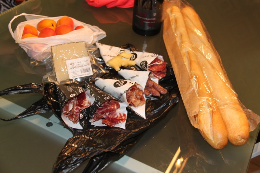cheese breads and meats on table during 3 days in Barcelona with kids
