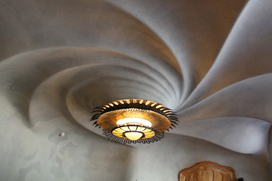 swirly ceiling like a shell inside Casa Mila