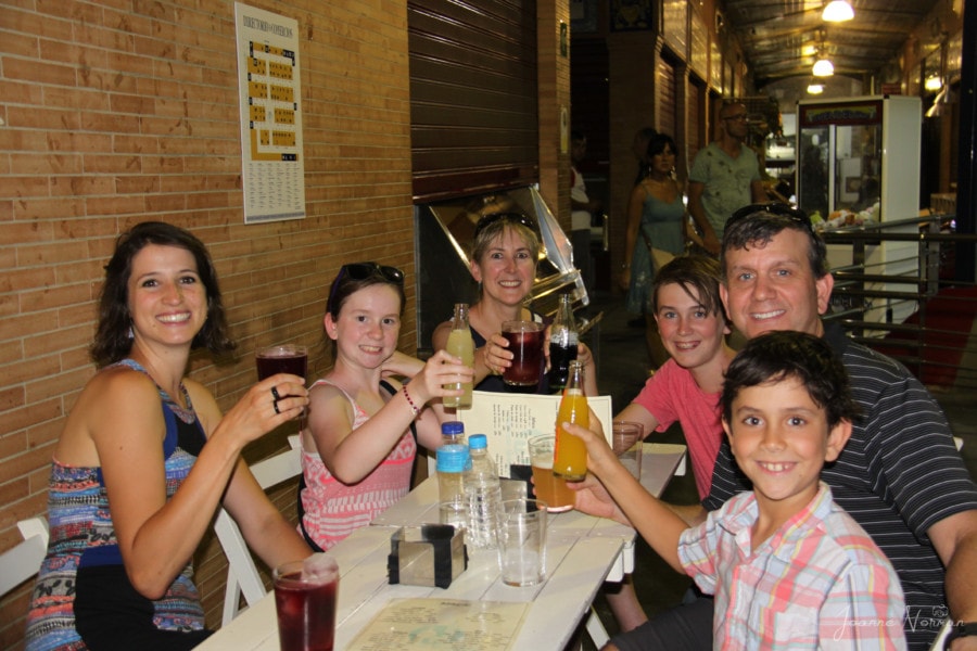 our family and guide doing cheers at tapas bar