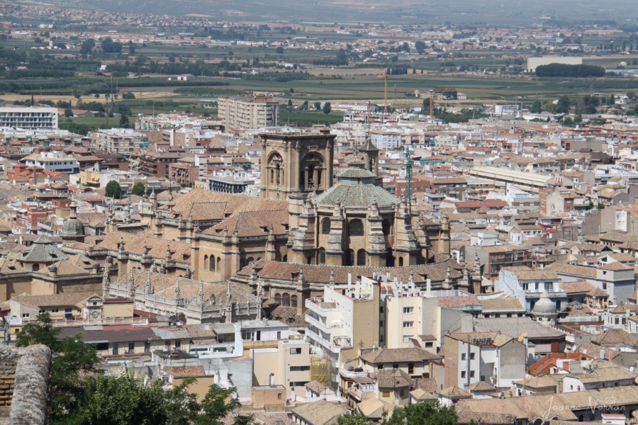 distant view of the Granada Cathedral among the city of Granada 