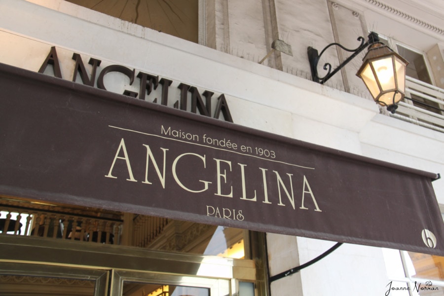 brown sign with Angelina on it hidden gem in paris