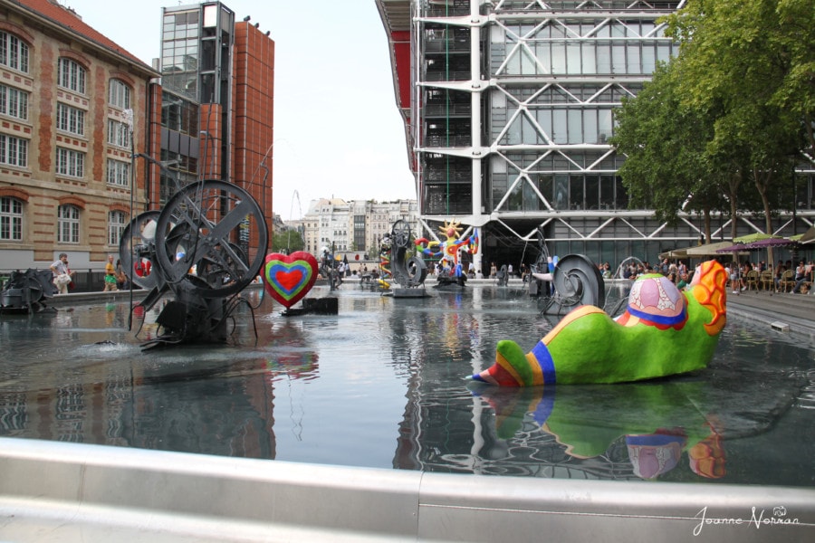 water with colourful sculptures in it