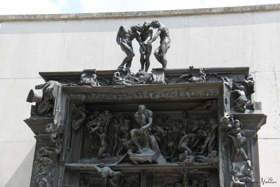 scupture door with each of Rodins sculptures in miniature