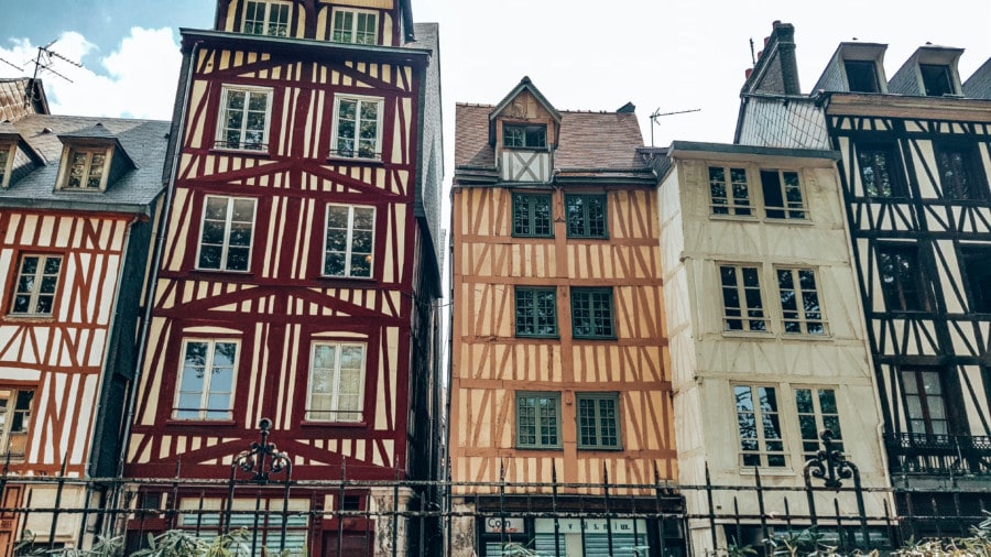 colourful tall buildings in a row daytrips from Paris