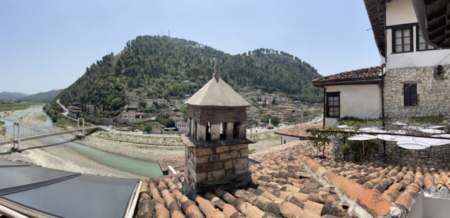 view from apartment berat with river and white houses