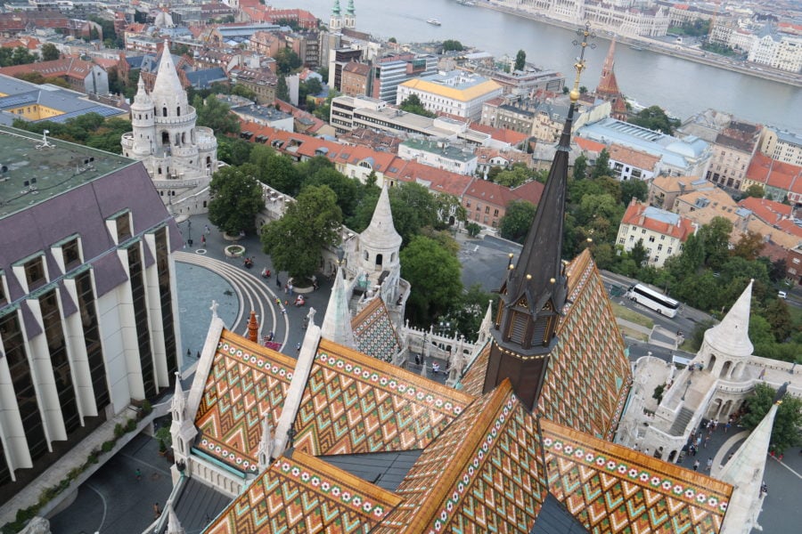 View looking down from Matthias Church Budapest over the beautiful gold and green roof below